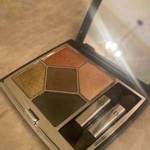 Dior eyeshadow Quint in the color 579 Jungle gently used.